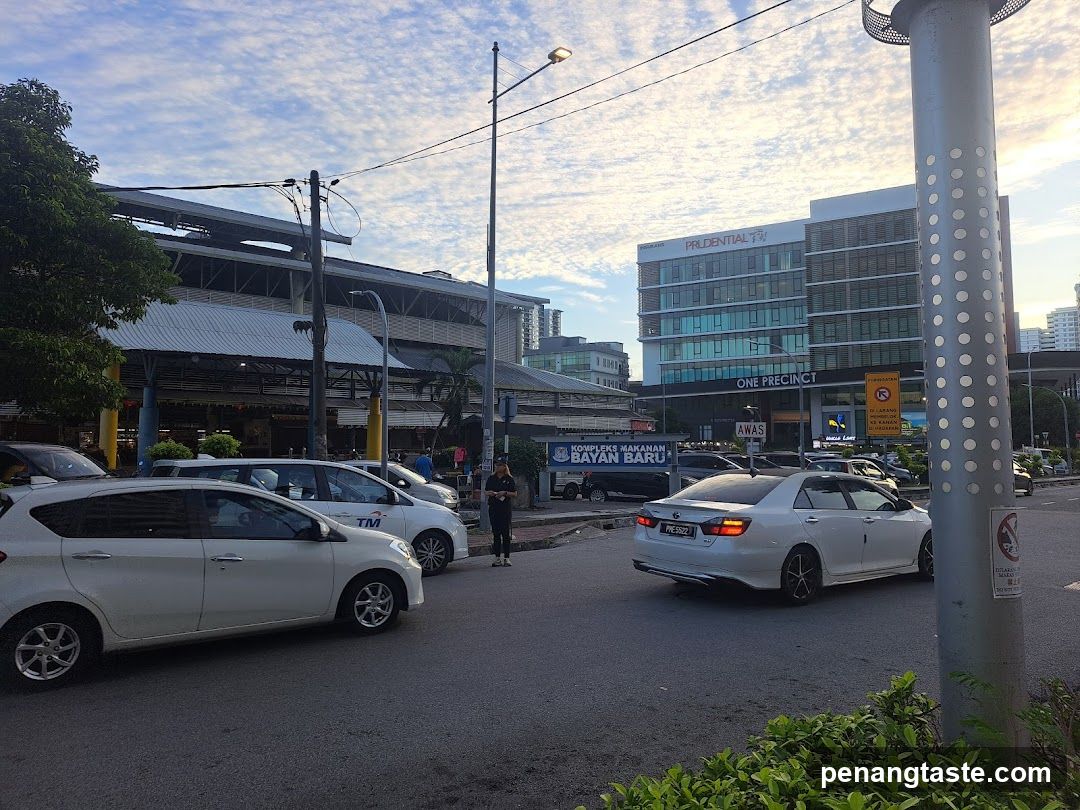 Outdoor street scene near Bayan Baru complex