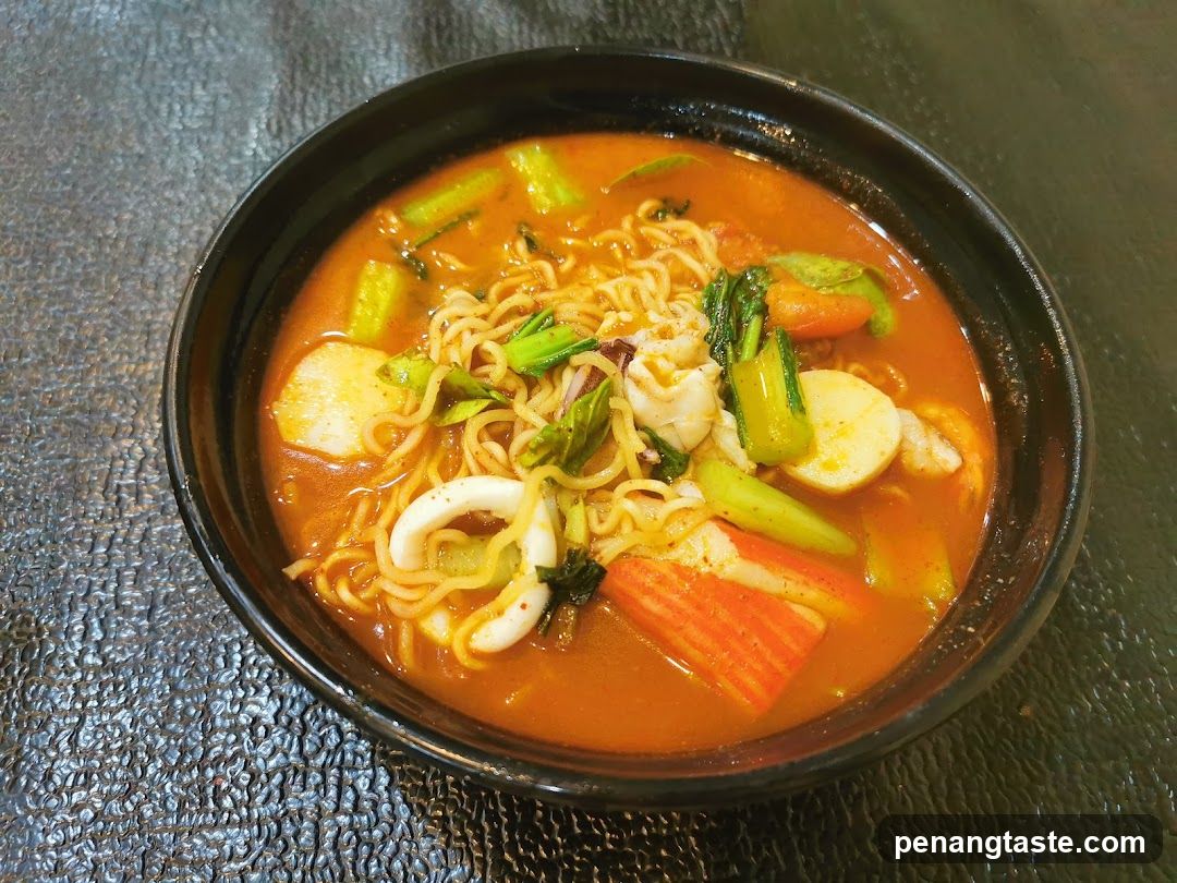 Noodle Soup in Black Bowl