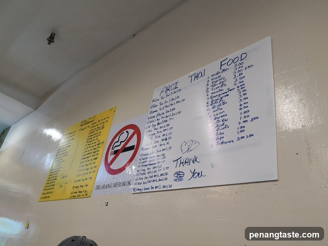 Wall-mounted signage with no-smoking notice and menus
