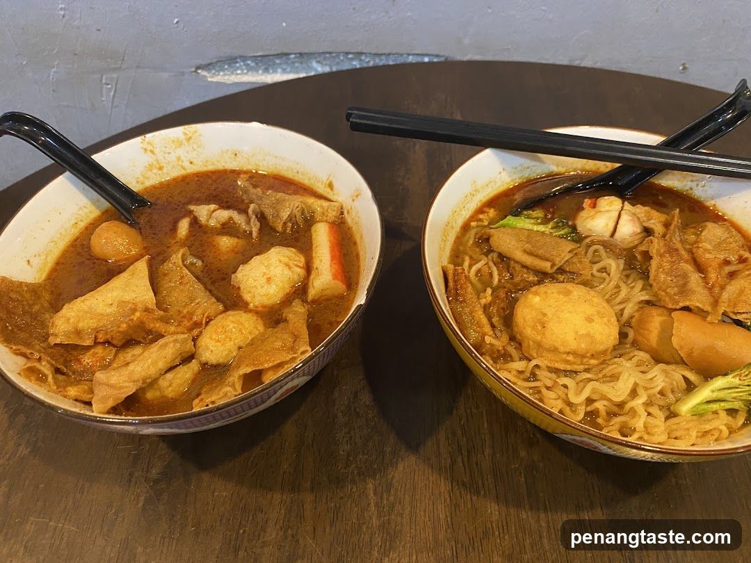 Two bowls of curry noodles
