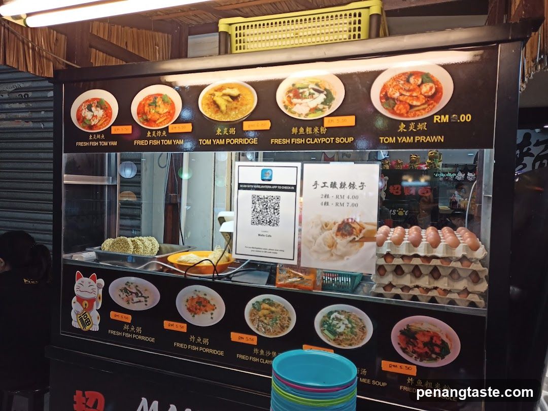Food stall display with dishes and pricing
