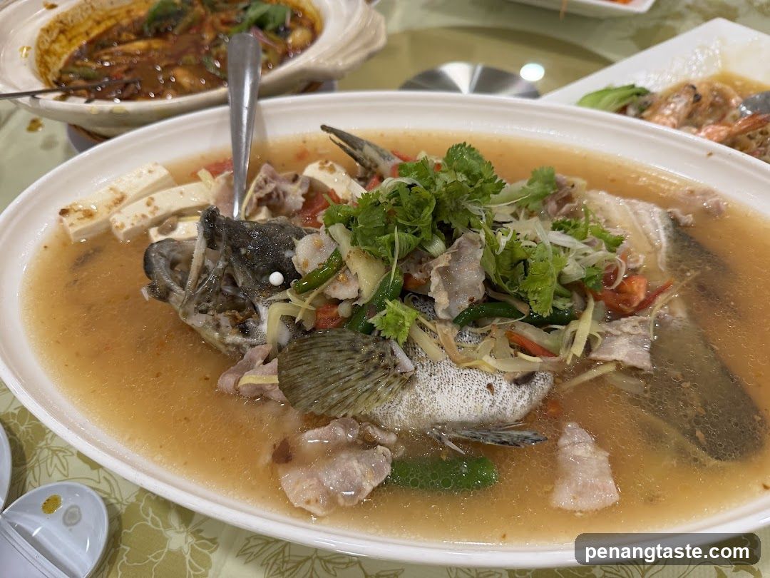 Dining Table with Fish Soup