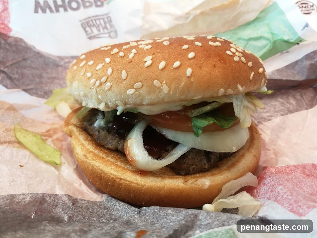 Burger on paper wrapper