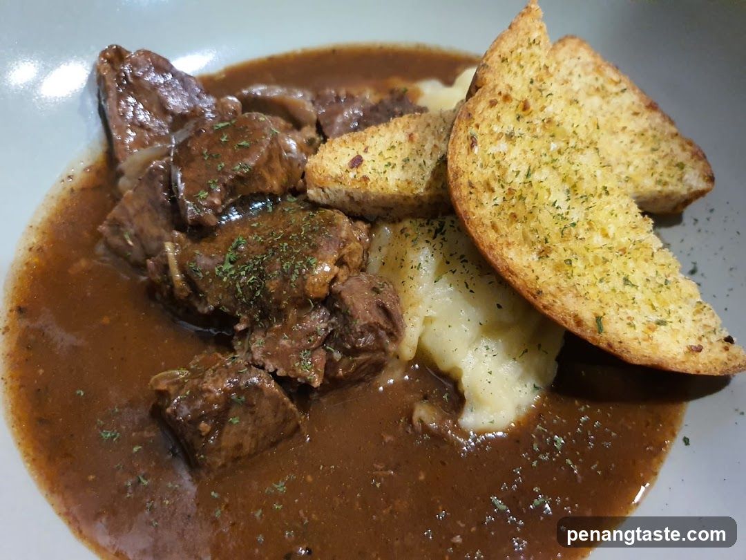 Beef Stew with Mashed Potatoes and Garlic Bread