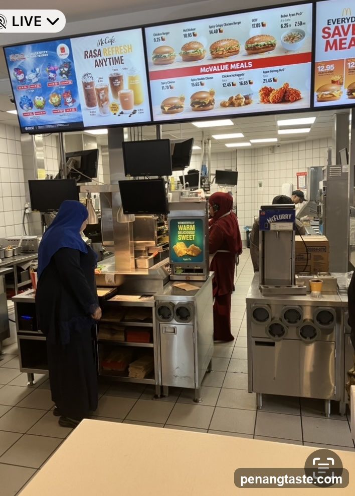 McDonald's interior with staff and equipment