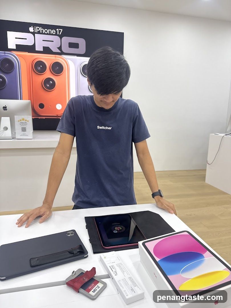 Man looking at iPads in a store