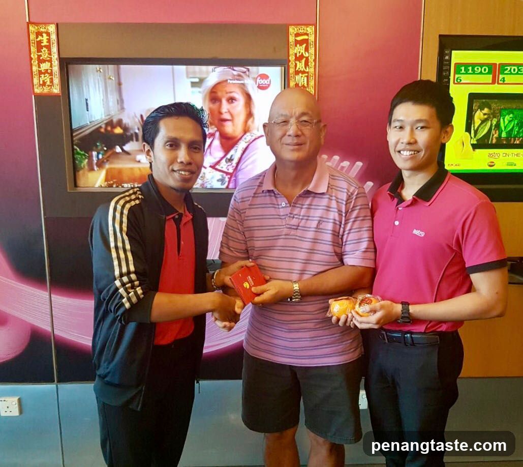 Three individuals posing indoors