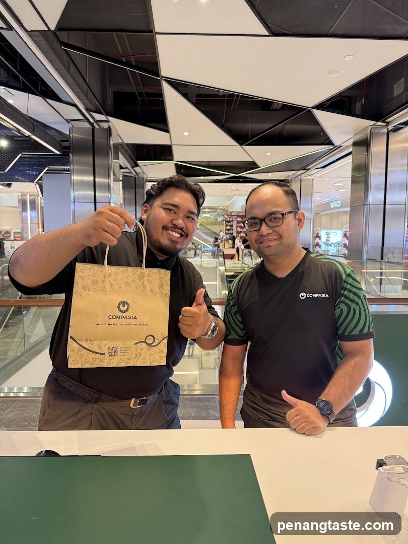 Two staff members at COMPASIA store