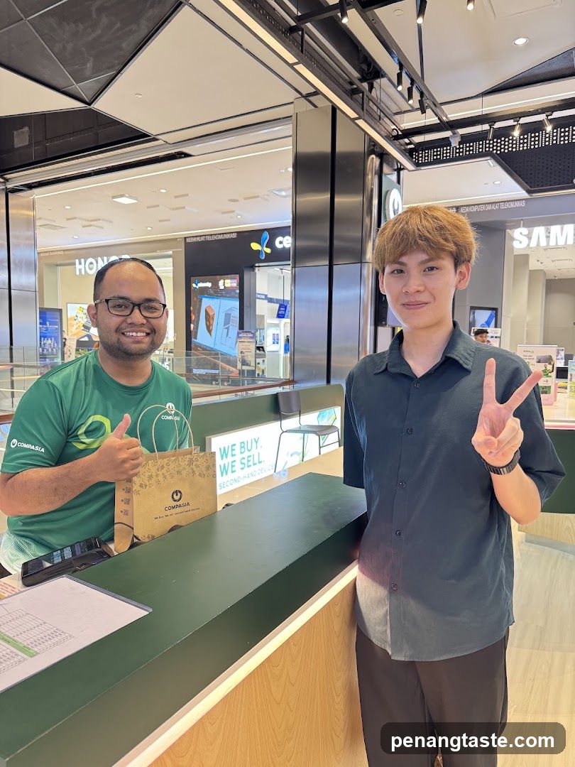 Two individuals at a retail counter