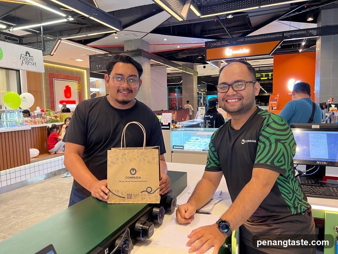 Two men at a retail counter