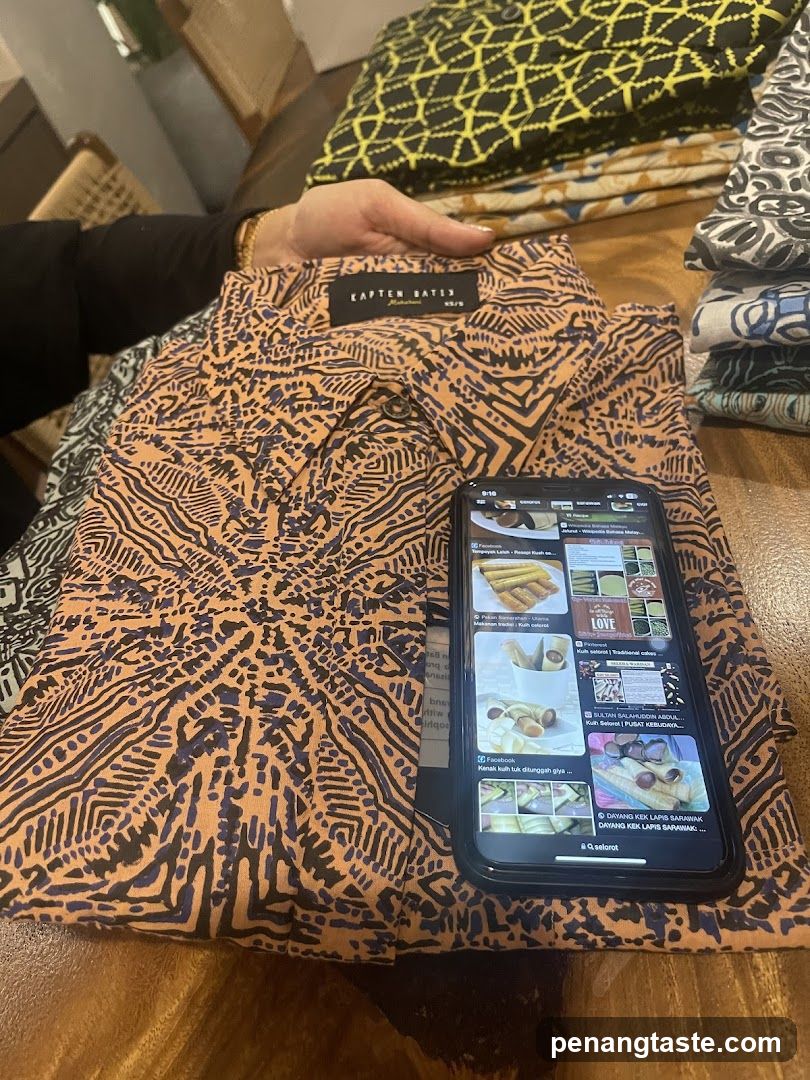 Batik Shirt and Phone Display