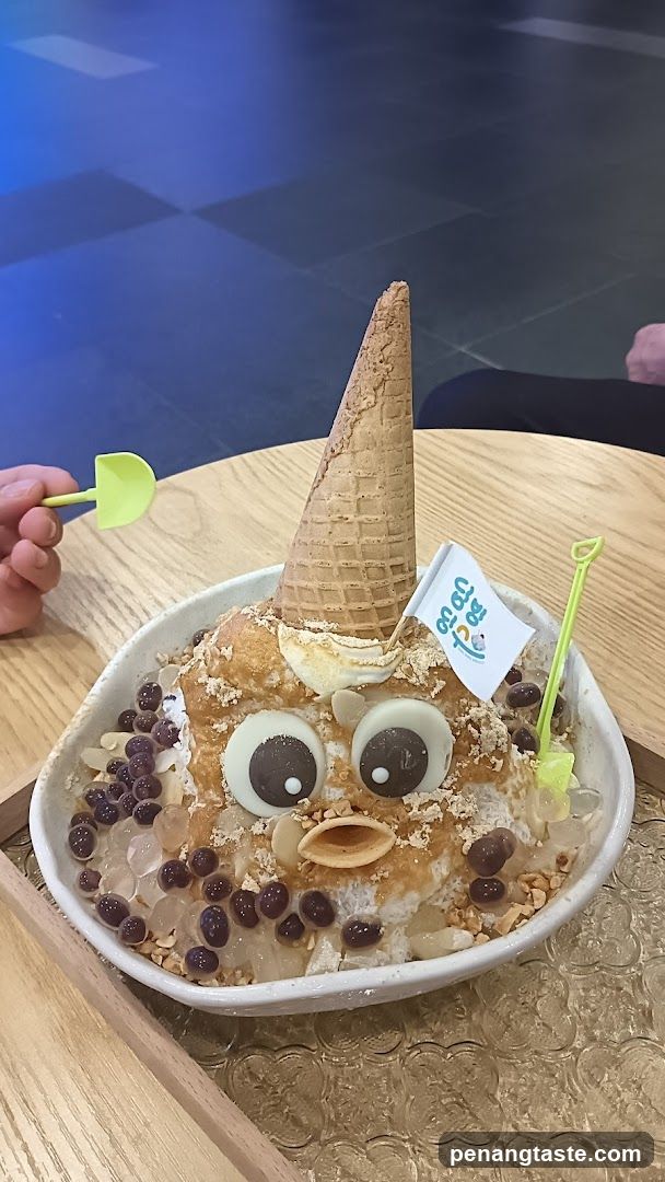 Bowl of ice cream dessert with face design