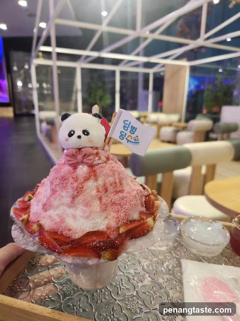 Strawberry shaved ice dessert with panda decoration