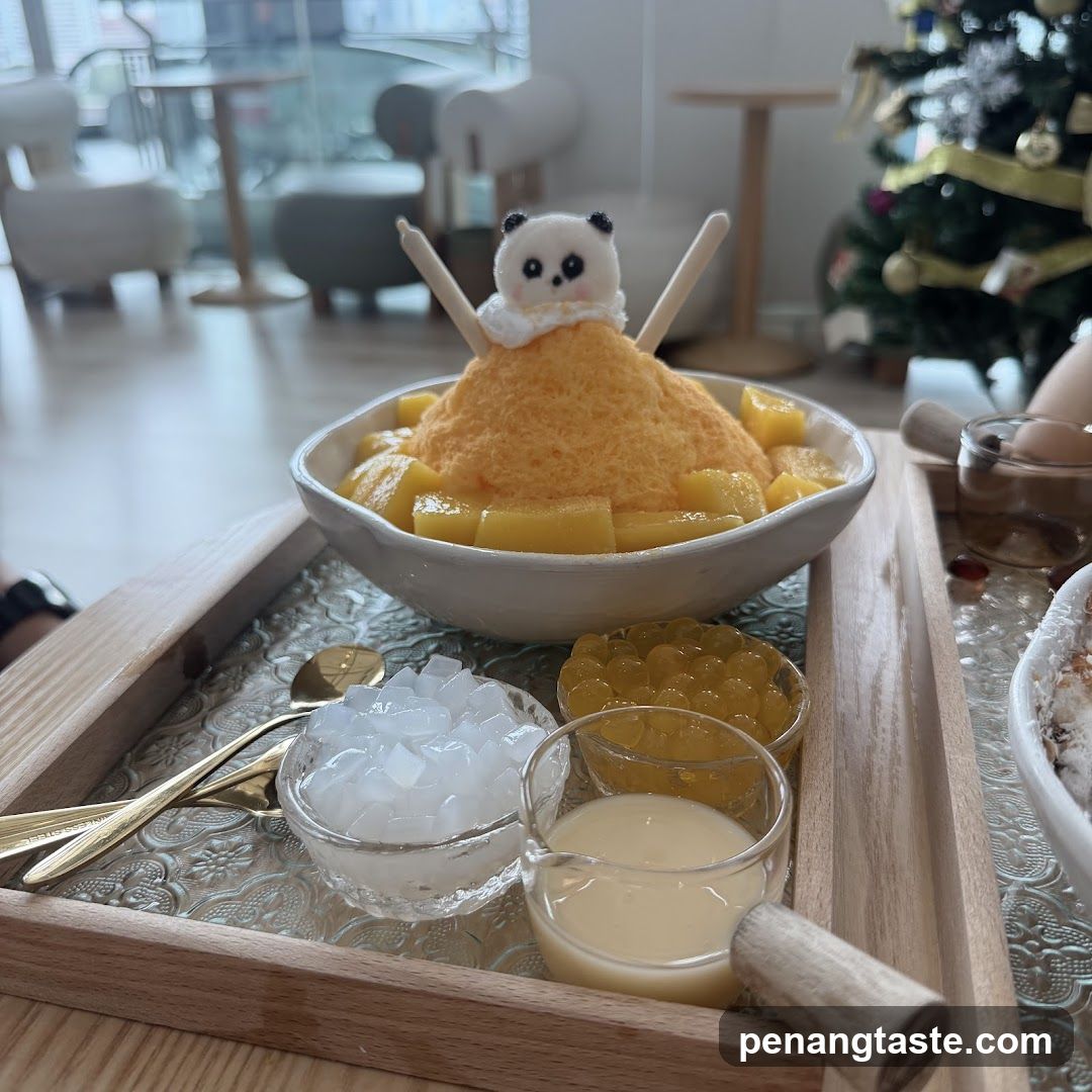 Bowl of shaved ice dessert with panda topper