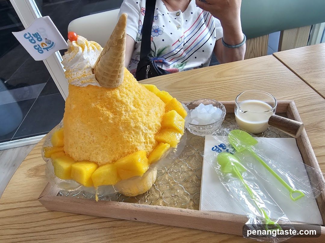 Mango dessert with ice cream cone