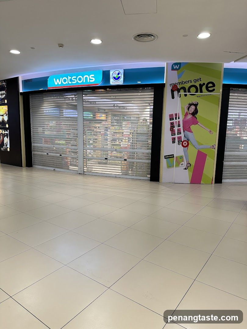 Watsons Storefront with Closed Roll-Up Doors