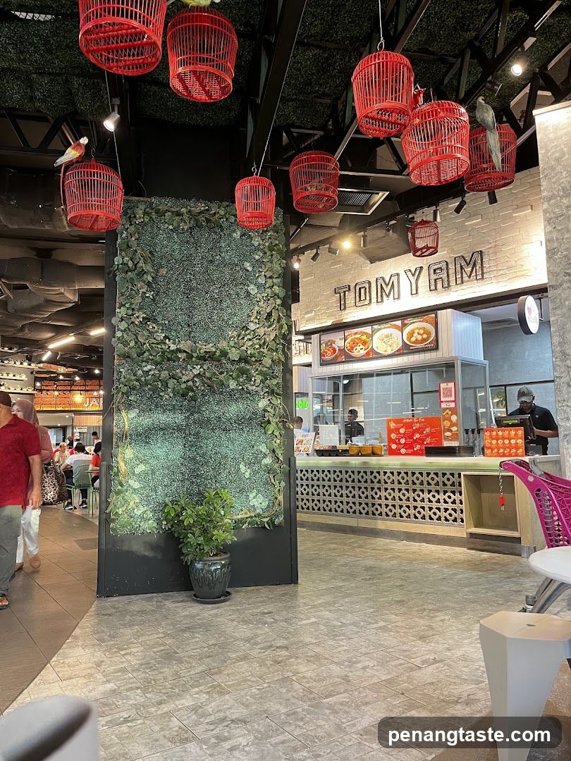 Interior of food court with TOMYAM stall