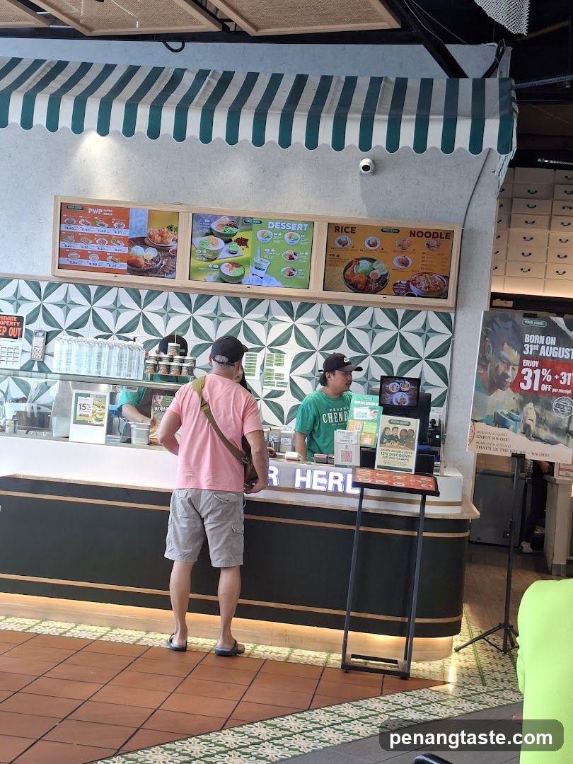 Restaurant counter with customer and staff