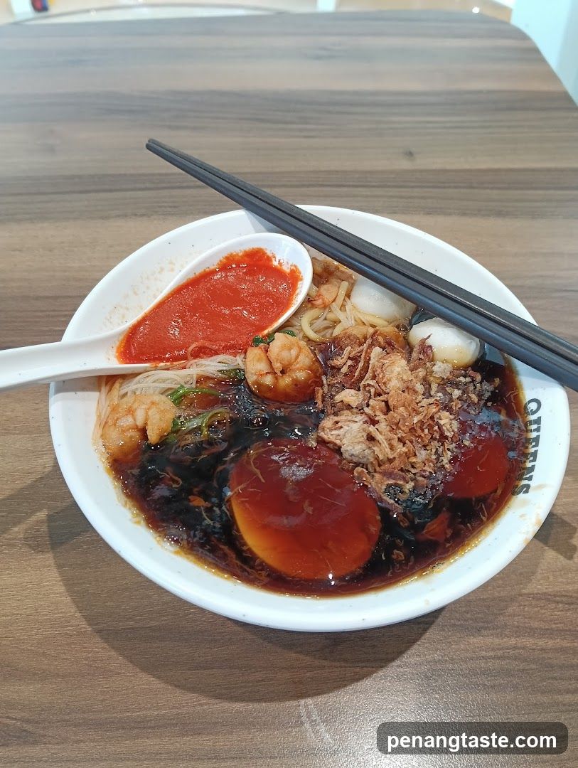 Noodle Bowl with Sauce and Chopsticks
