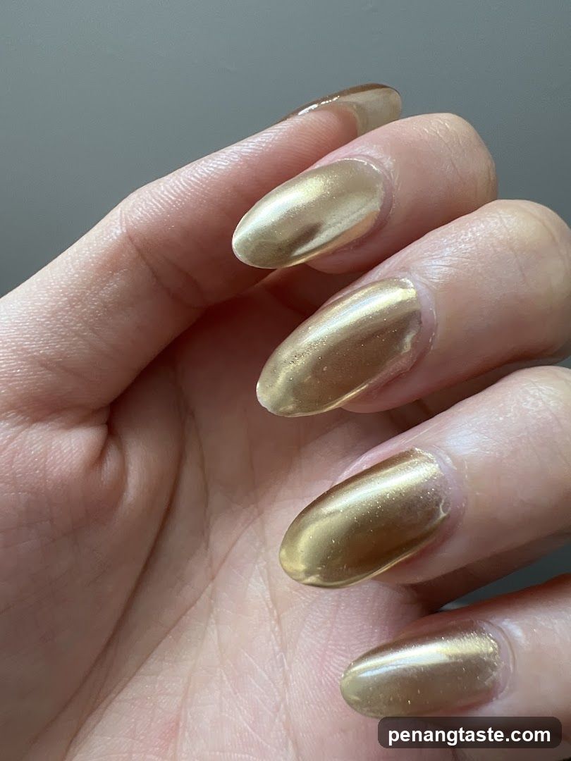 Hand with Golden Nails