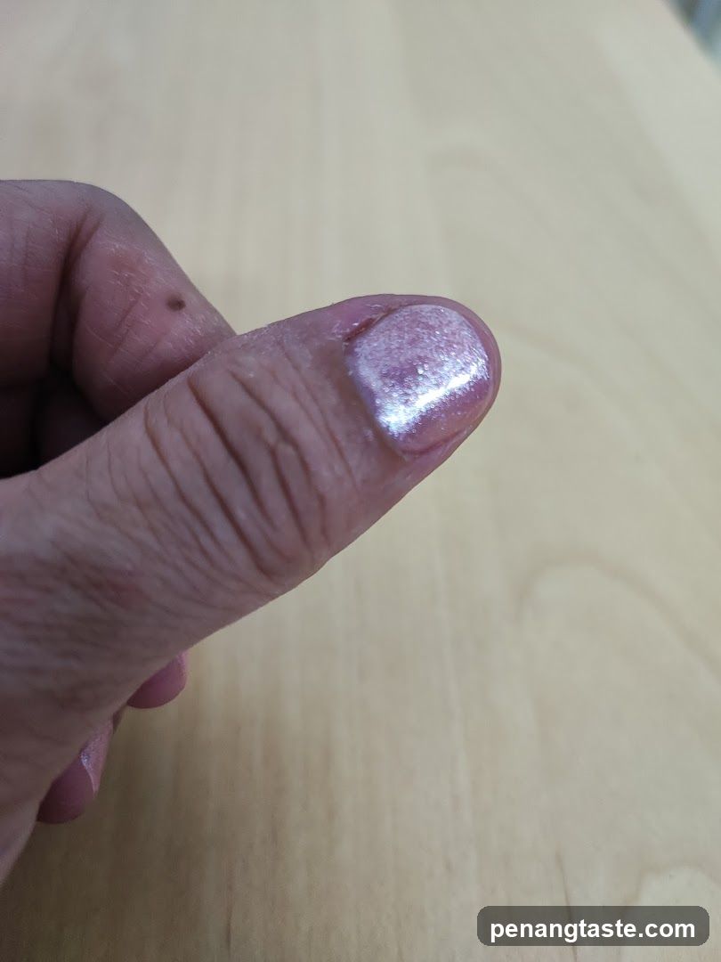 Hand with painted fingernail