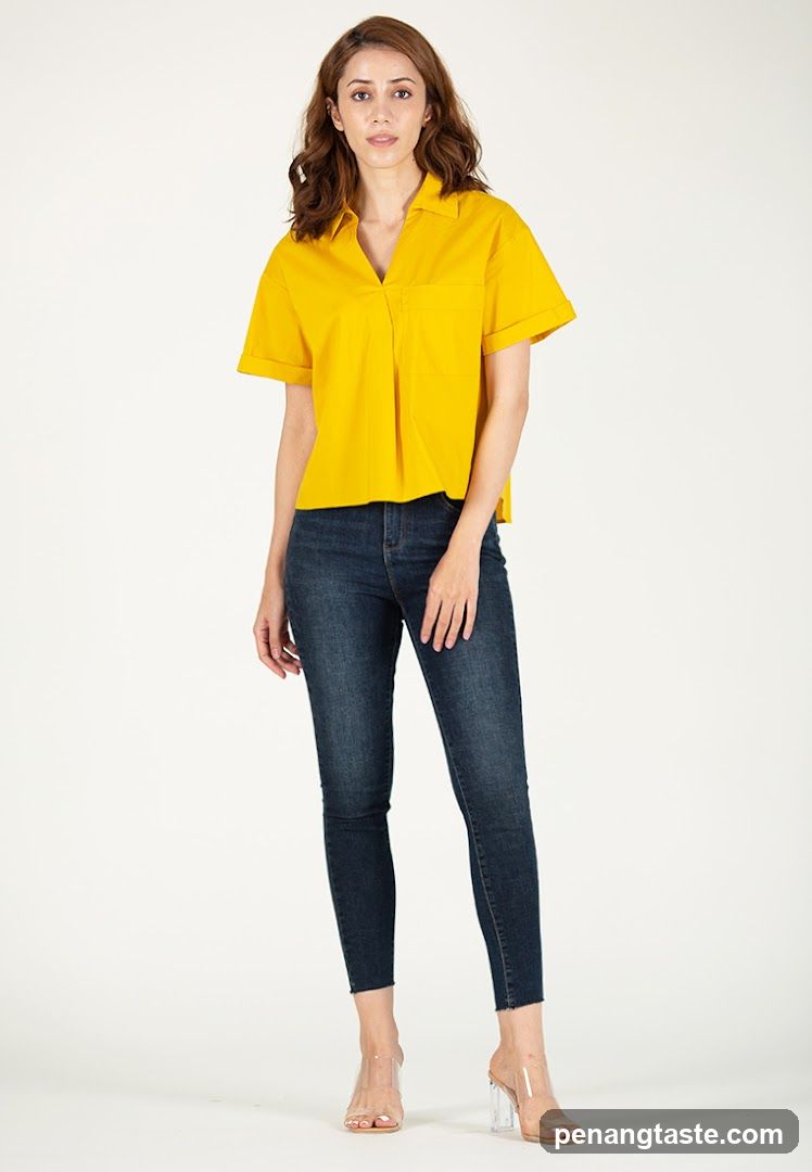 Woman in Yellow Top and Jeans