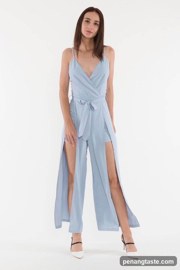 Model wearing light blue jumpsuit
