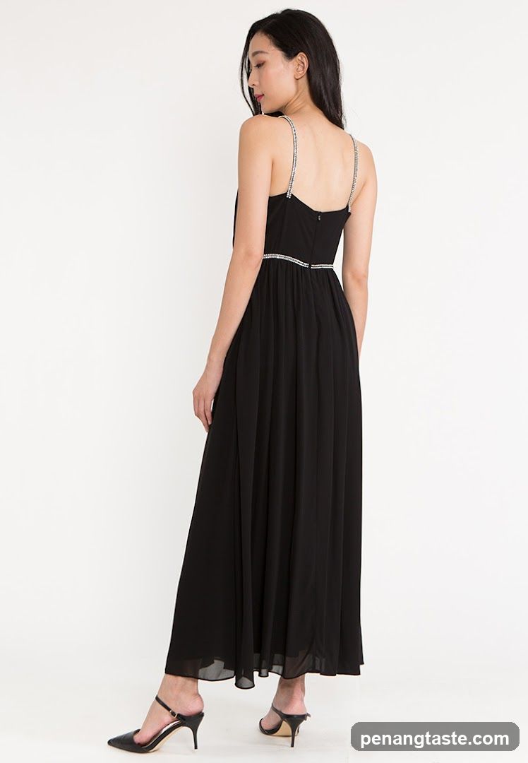 Model wearing black dress
