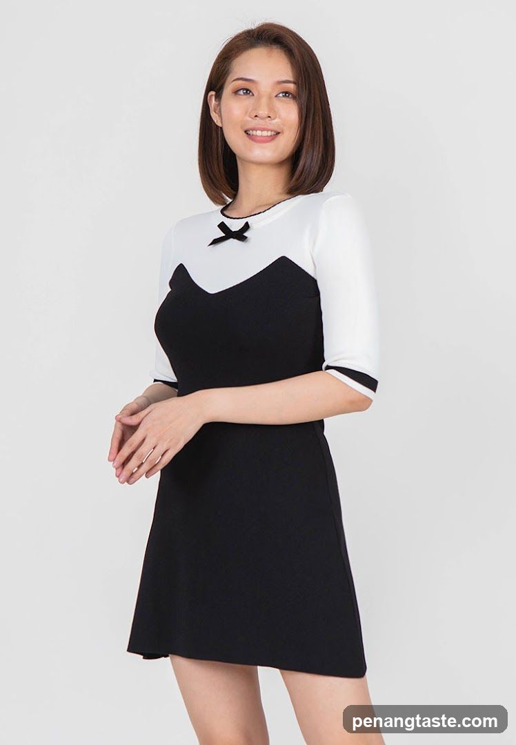 Woman in black and white dress