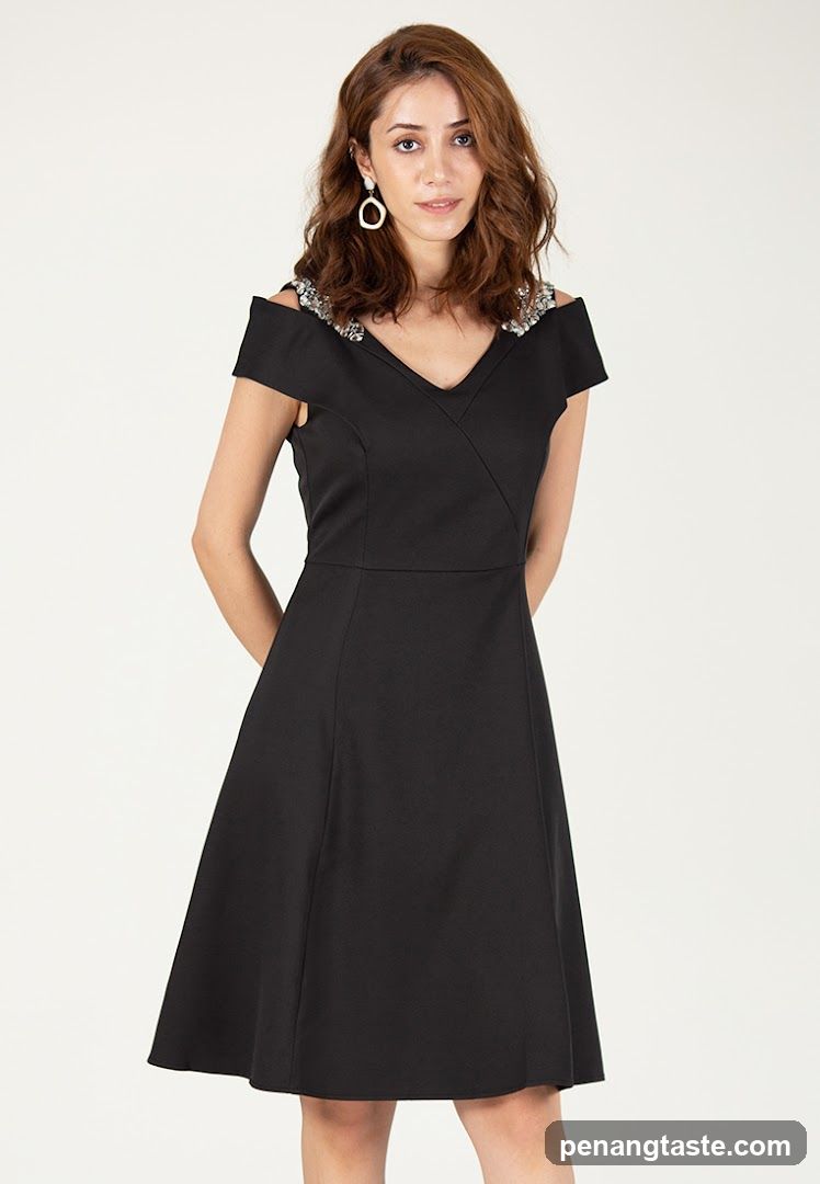 Model wearing black dress