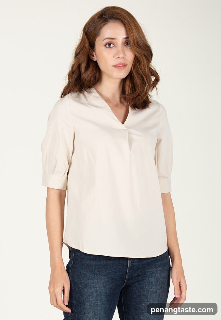 Woman wearing blouse