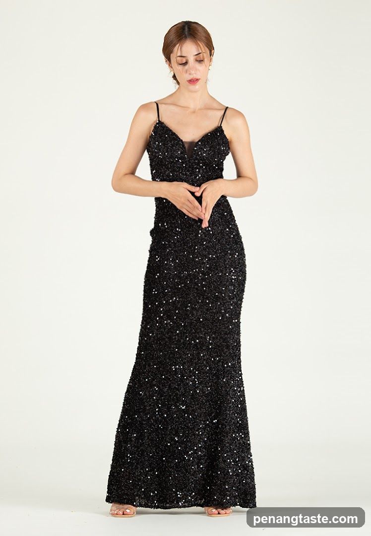 Woman in Black Sequin Gown
