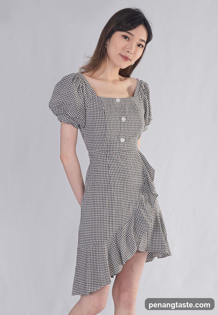 Model wearing checkered dress