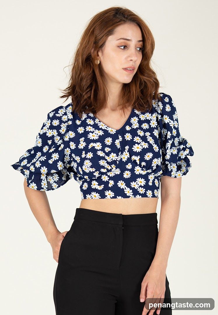 Model wearing floral crop top