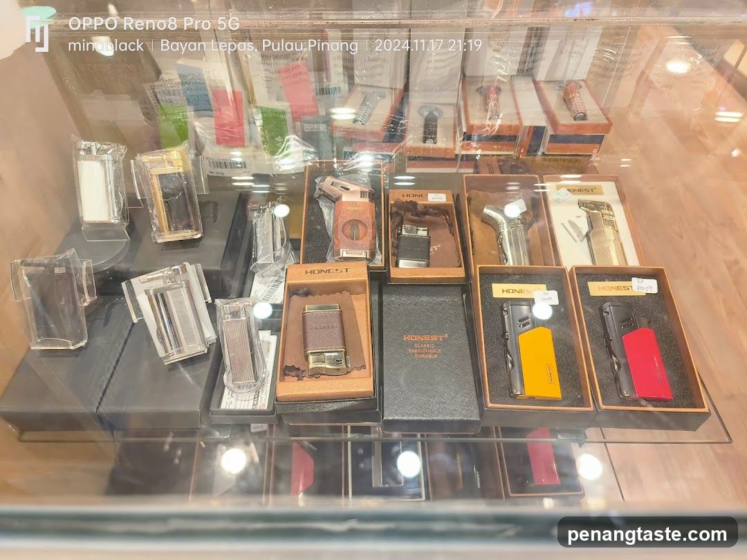 Display of Cigar Lighters in Glass Case