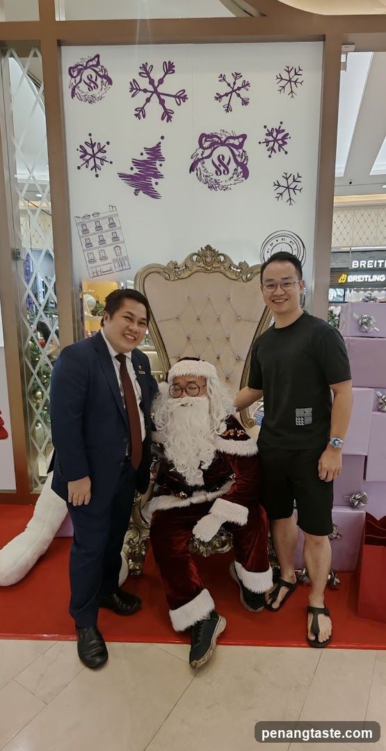 Santa Claus with two men