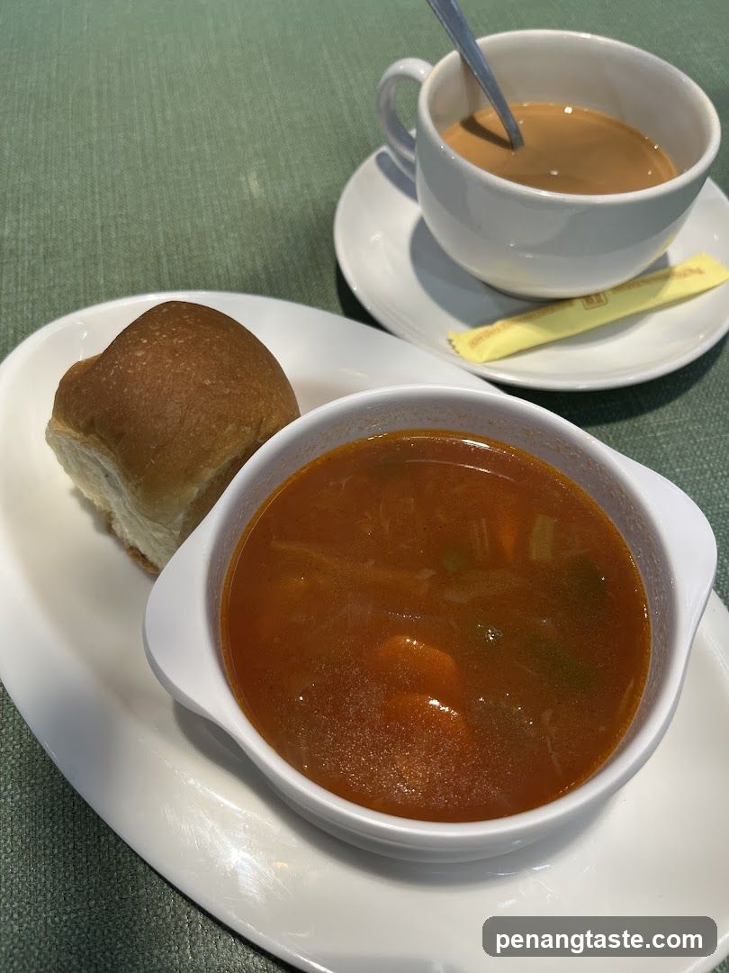 Table Setting with Soup, Bread, and Tea