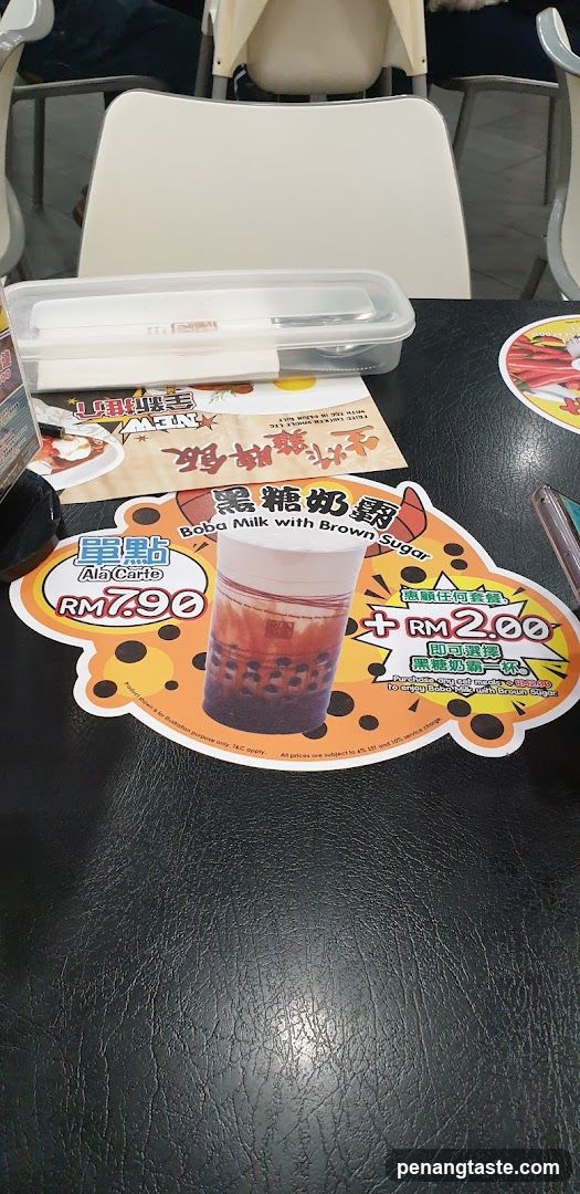 Tabletop with drink promotion sticker