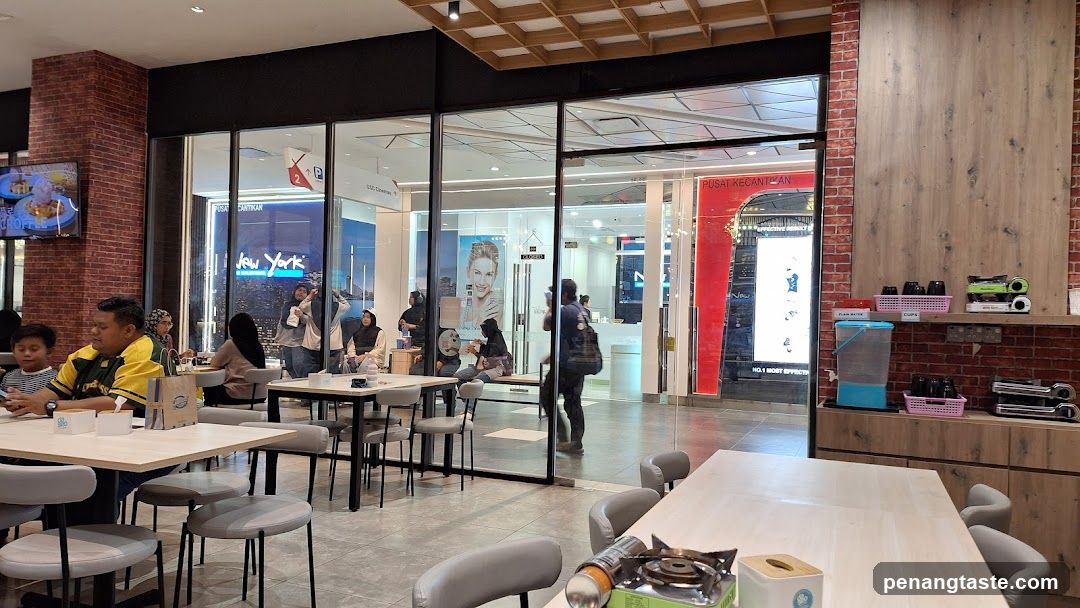 Interior of a cafe with customers dining