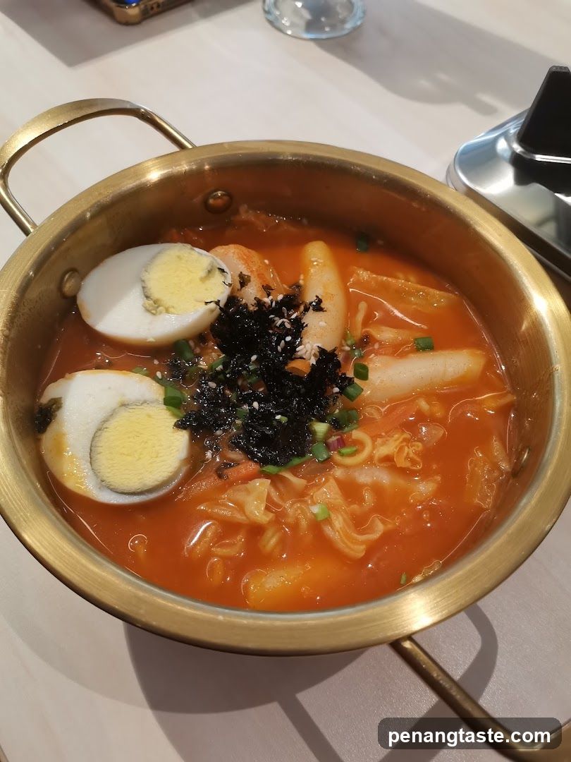 Food dish in golden pot