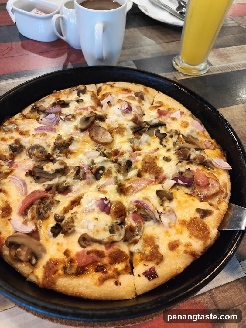Pizza and beverages on table