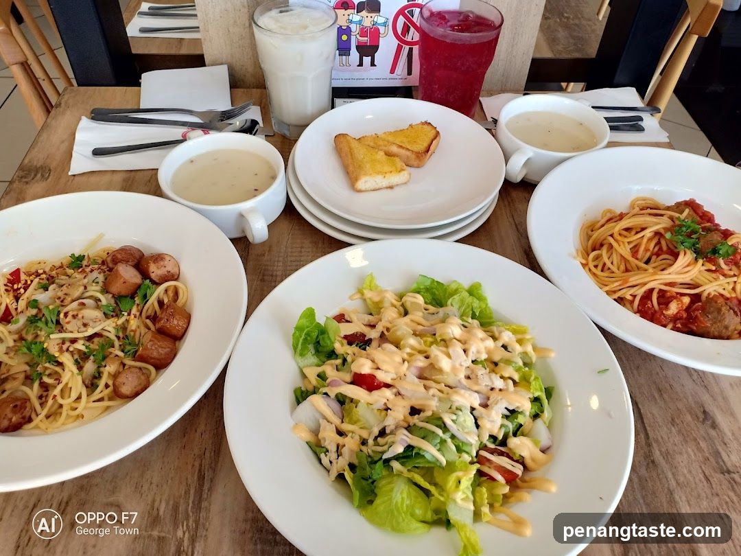 Dinner Table with Food and Drinks