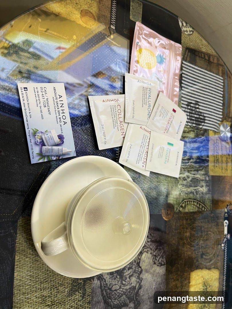 Tabletop with AINHOA products and cup