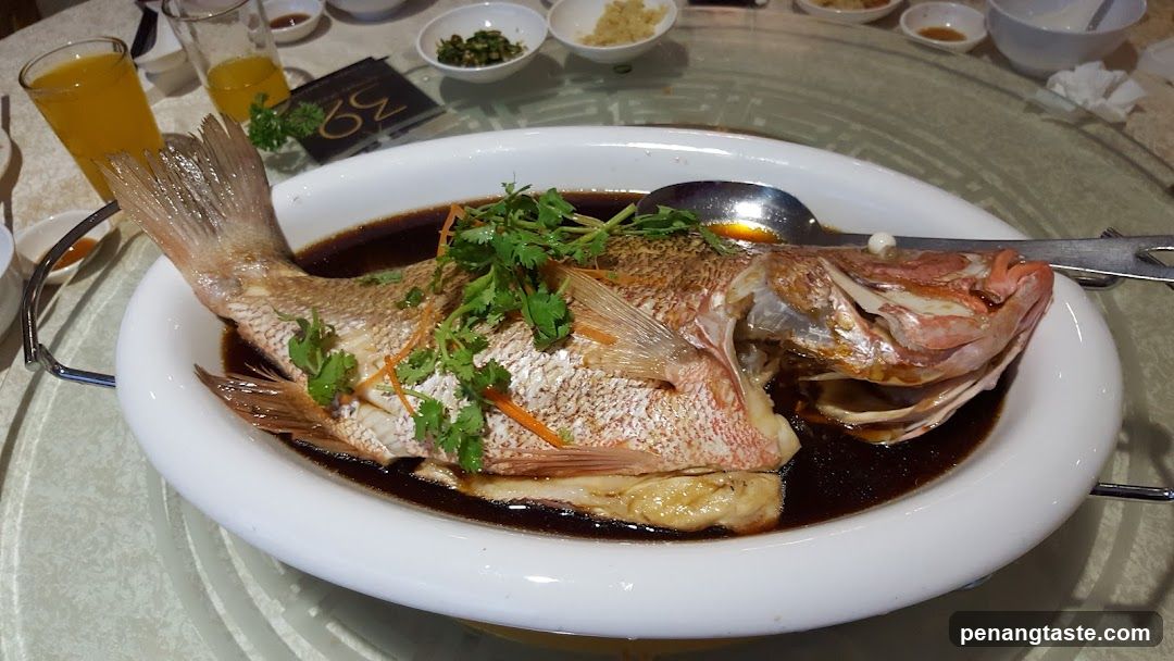 Dining Table with Steamed Fish