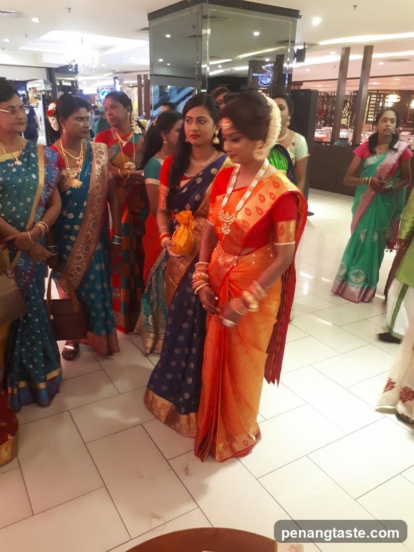 Group of women in traditional attire indoors