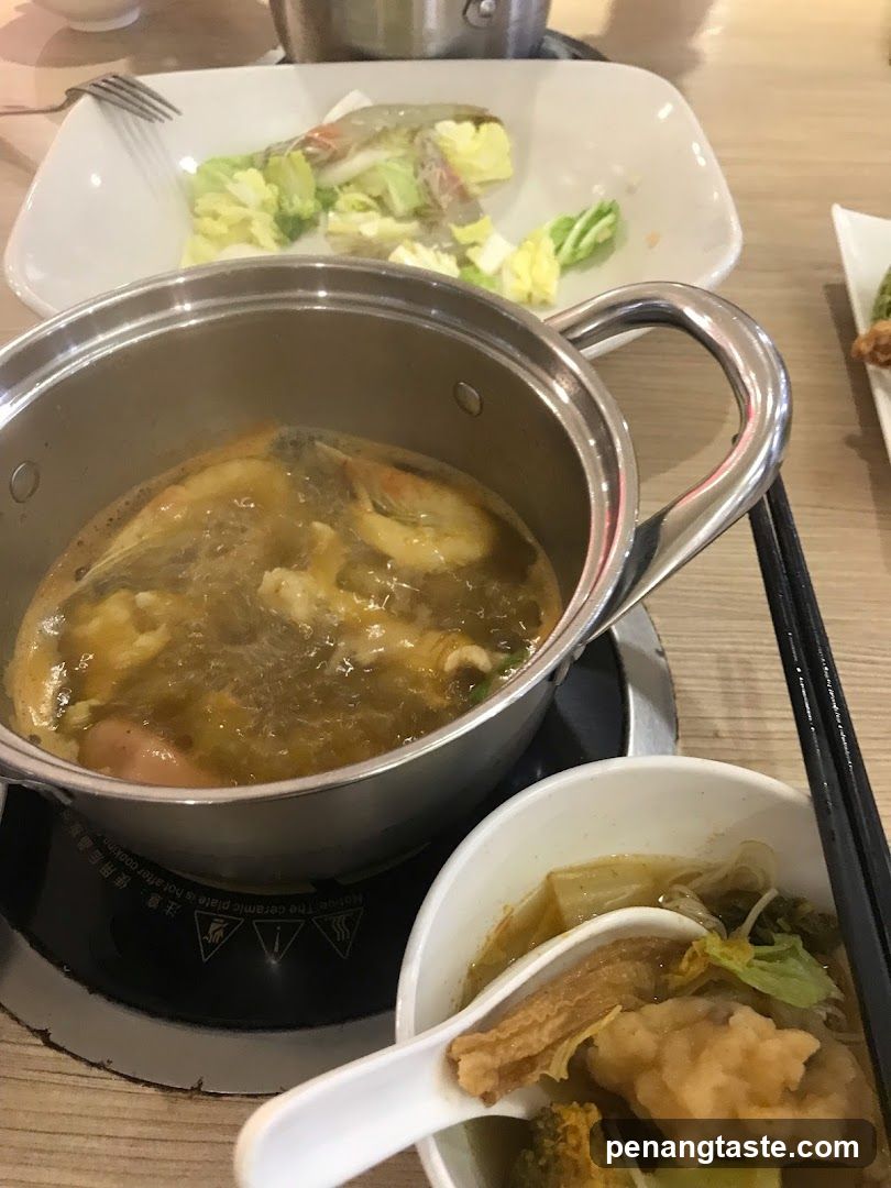 Table Setting with Hot Pot and Side Dishes