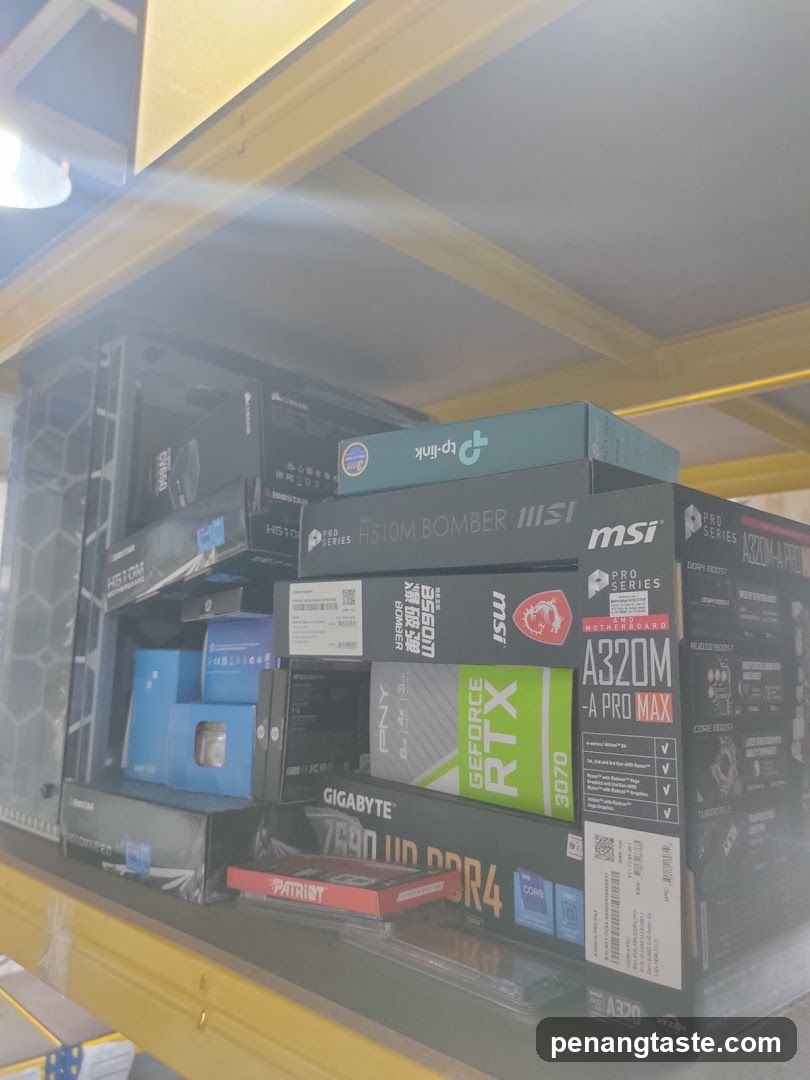 Computer Hardware Boxes on Shelf