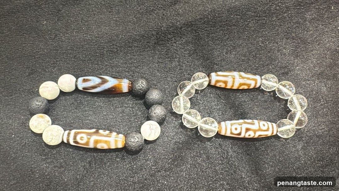 Two bracelets with dzi beads