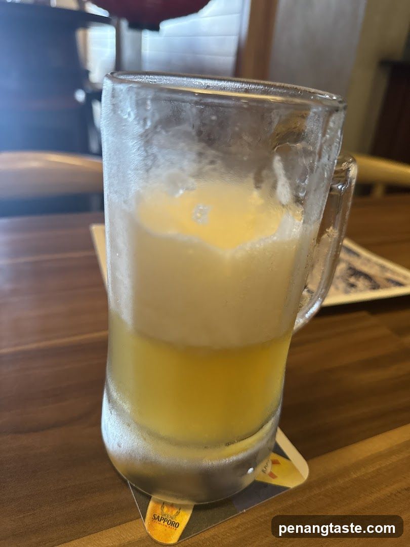 Beer in mug on coaster