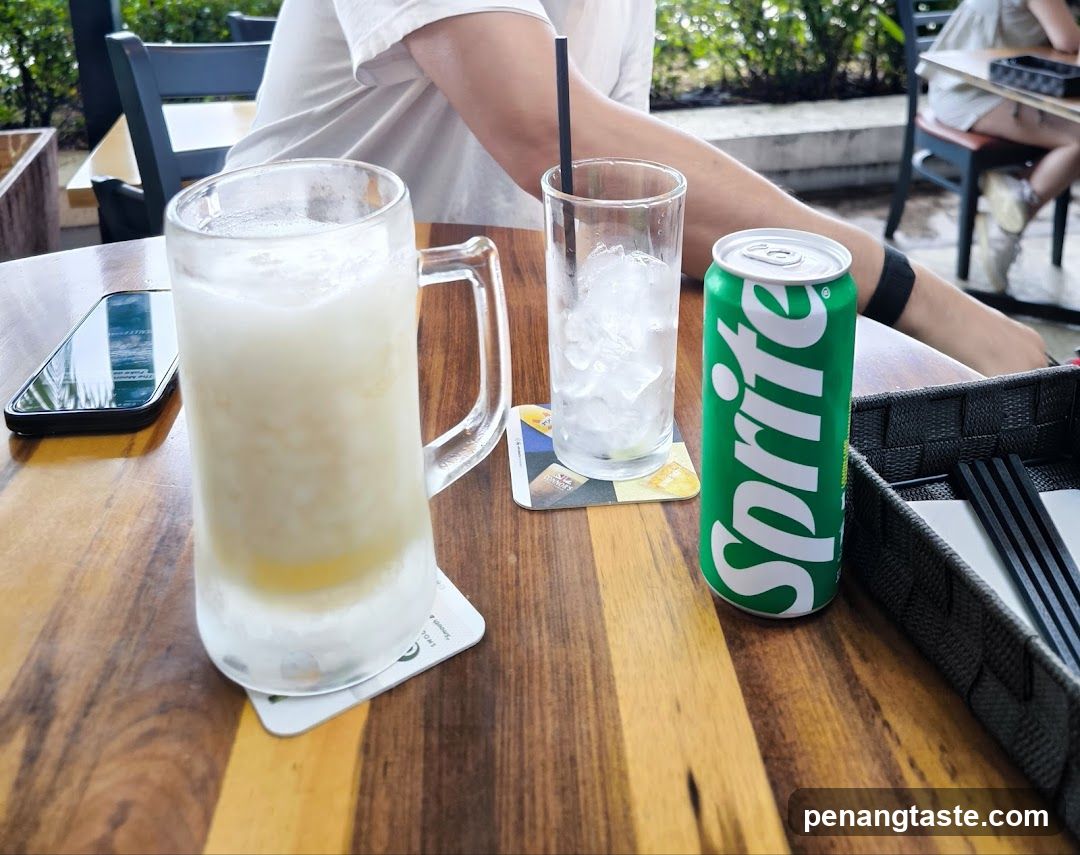 Table with beverages and phone